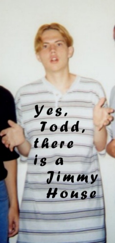 The shirt is so long it looks like Todd is in a dress.